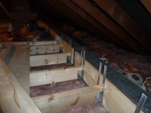 Day 18 – Floor joists spanning the loft